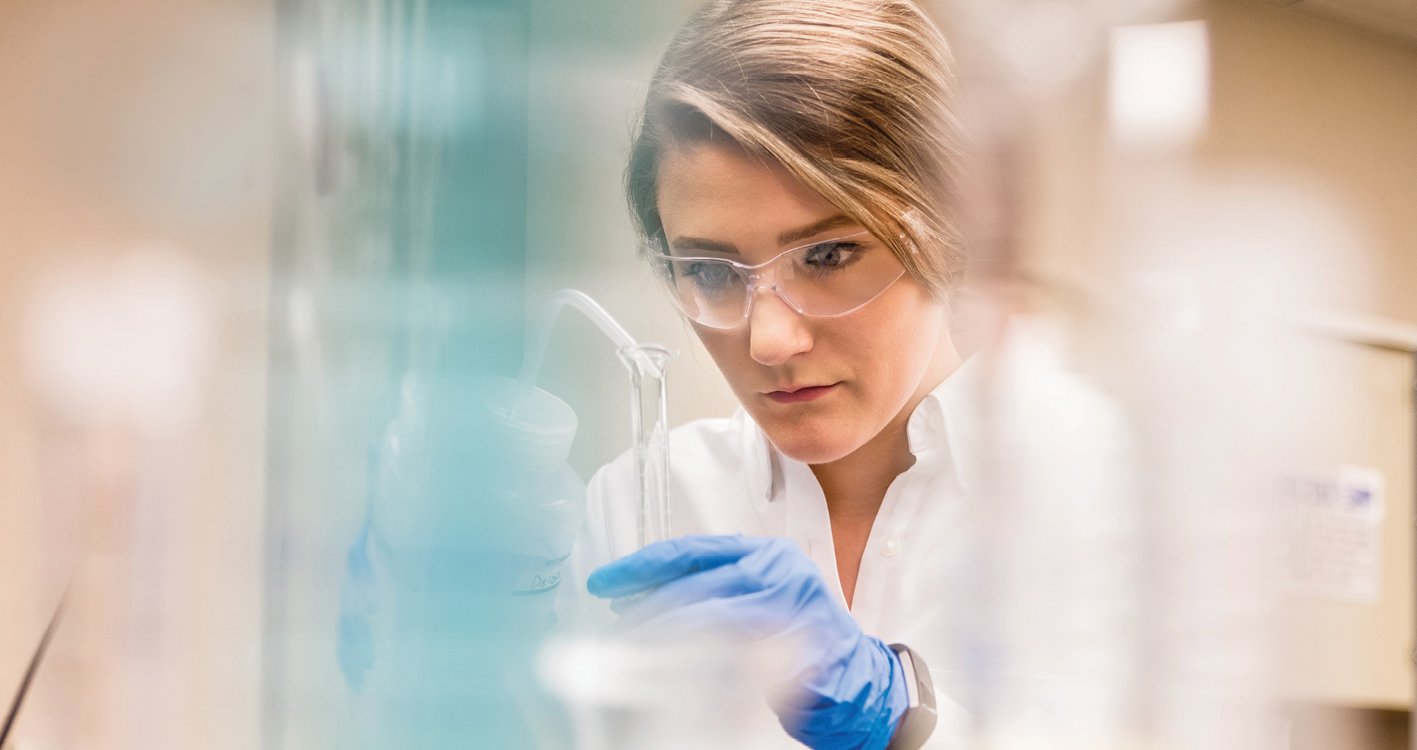 associate performing testing in a lab