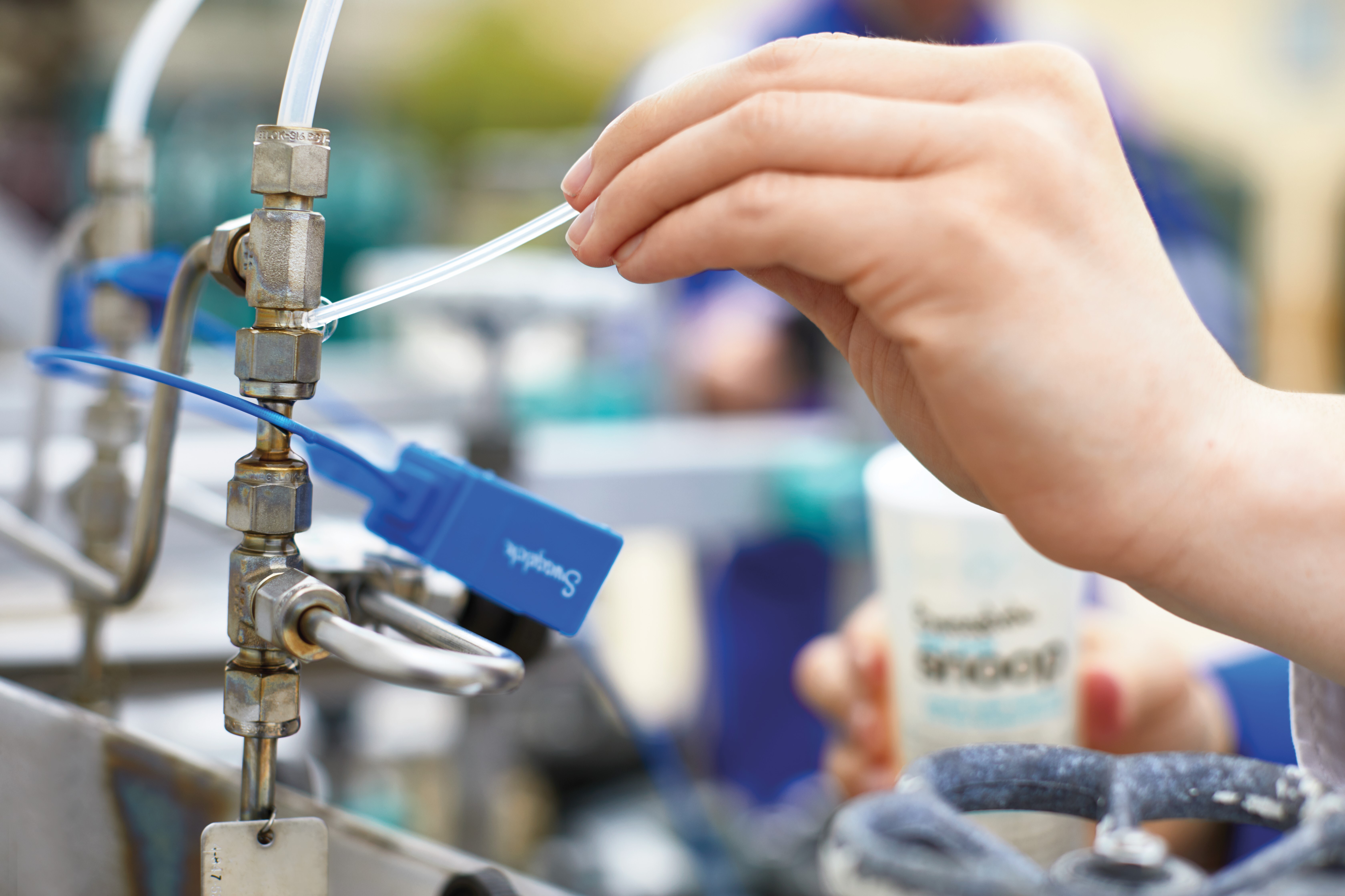 Closeup of Swagelok tag on section of fluid system test that is being tested with Snoop
